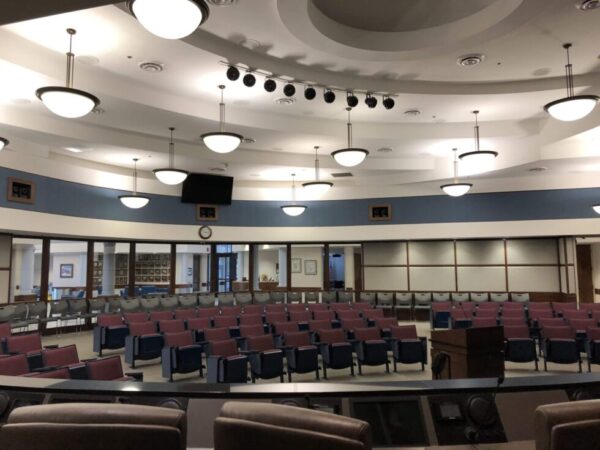 Audience (empty chairs) of Norman City Council