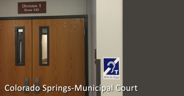 Colorado Springs municipal court with symbol on wall