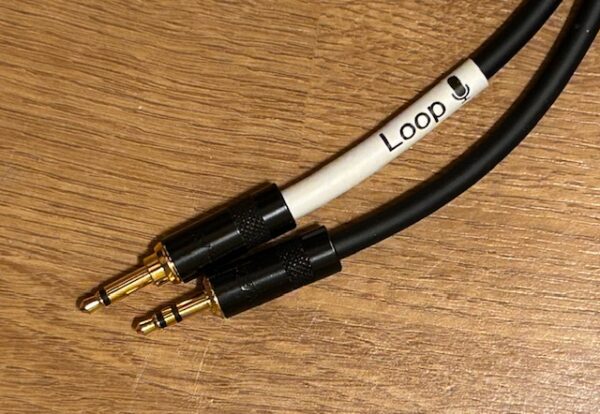 Converter cable for counter hearing loop showing the two jacks