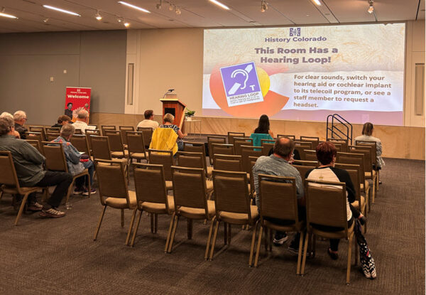 PowerPoint slide shown to attendees before event starts at History Colorado Center