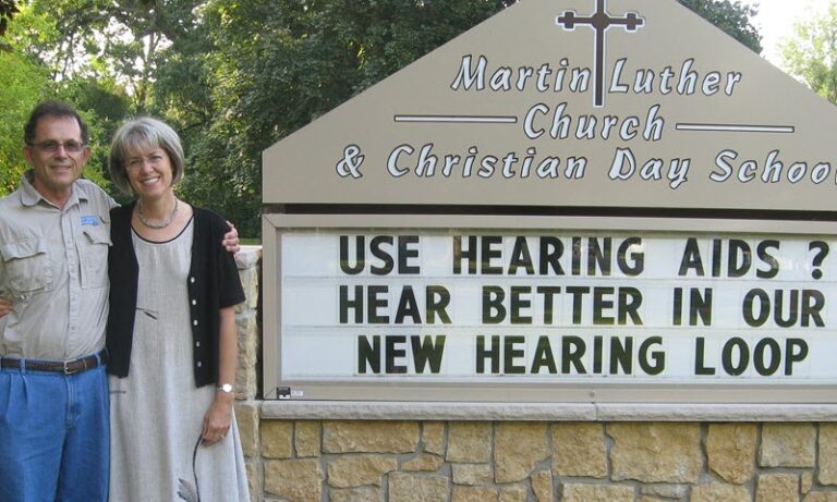 Martin Luther Church with sign "use hearing aids? Hear better in our new hearing loop"